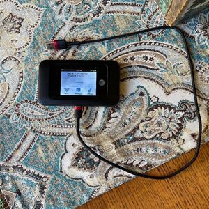 AT&T ZTE Mobile Hotspot router, puck, internet and charging cord
